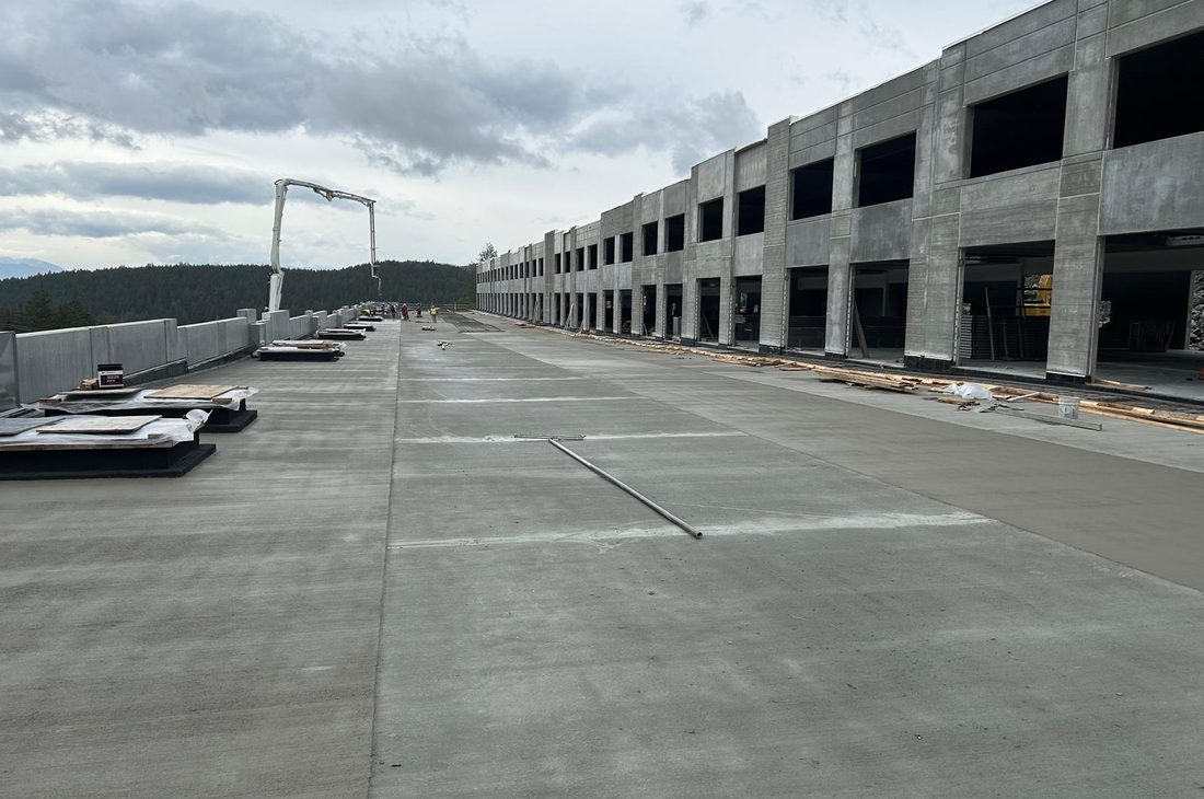 Large finished concrete slab and apron at a tilt-up industrial building
